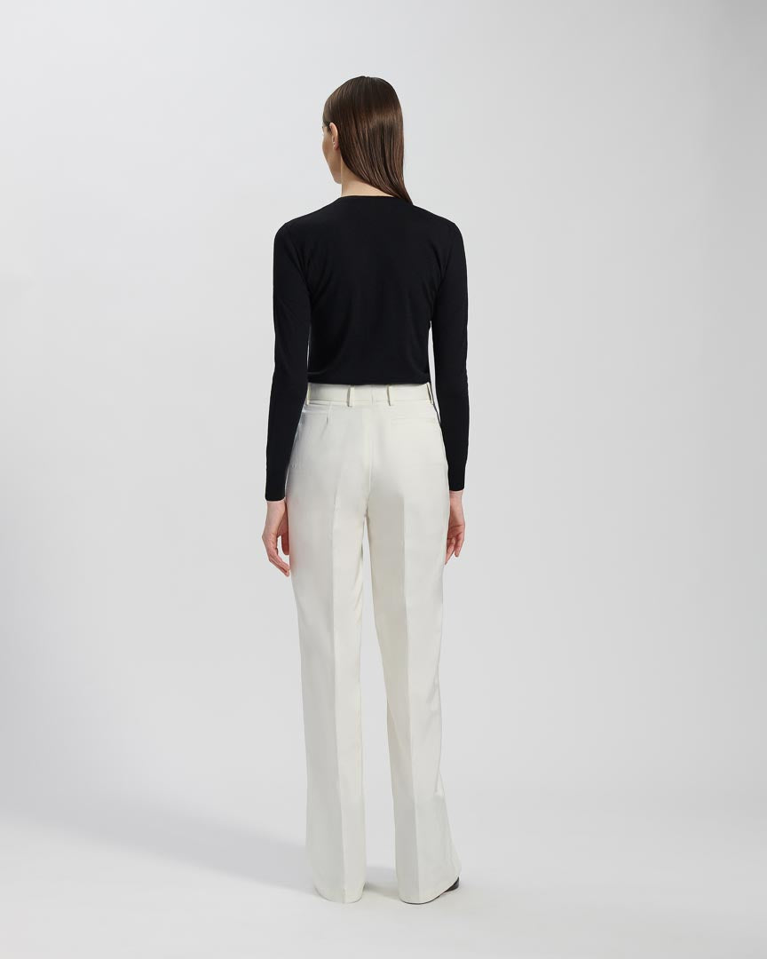 White Anya Trousers in Peau De Soie by SALE, elegant women's bottoms with smooth, luxurious fabric and tailored fit.