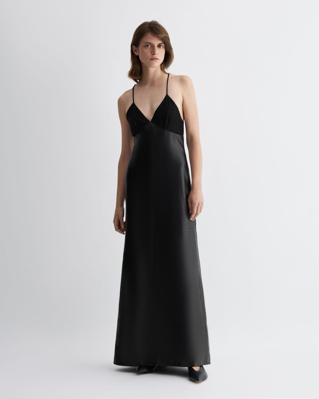 Black Amelia Dress in Nappa Leather by Veronica De Piante, showcasing a sleek, stylish dress with smooth leather texture.