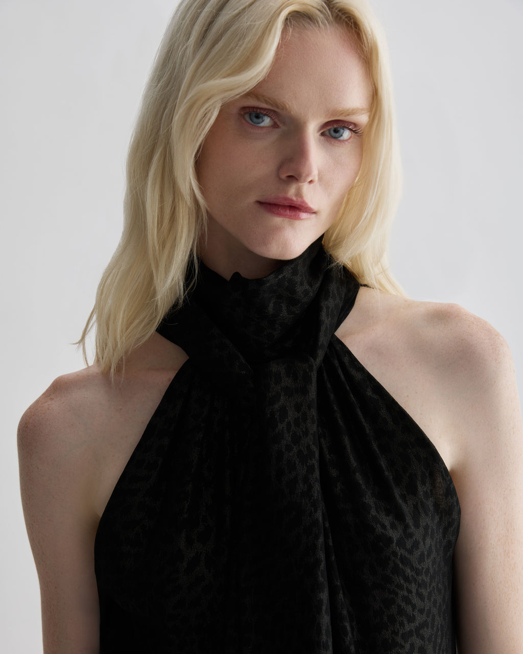 Silver leopard print silk Elysia top by Veronica De Piante, showcasing a stylish design and elegant fabric draping.