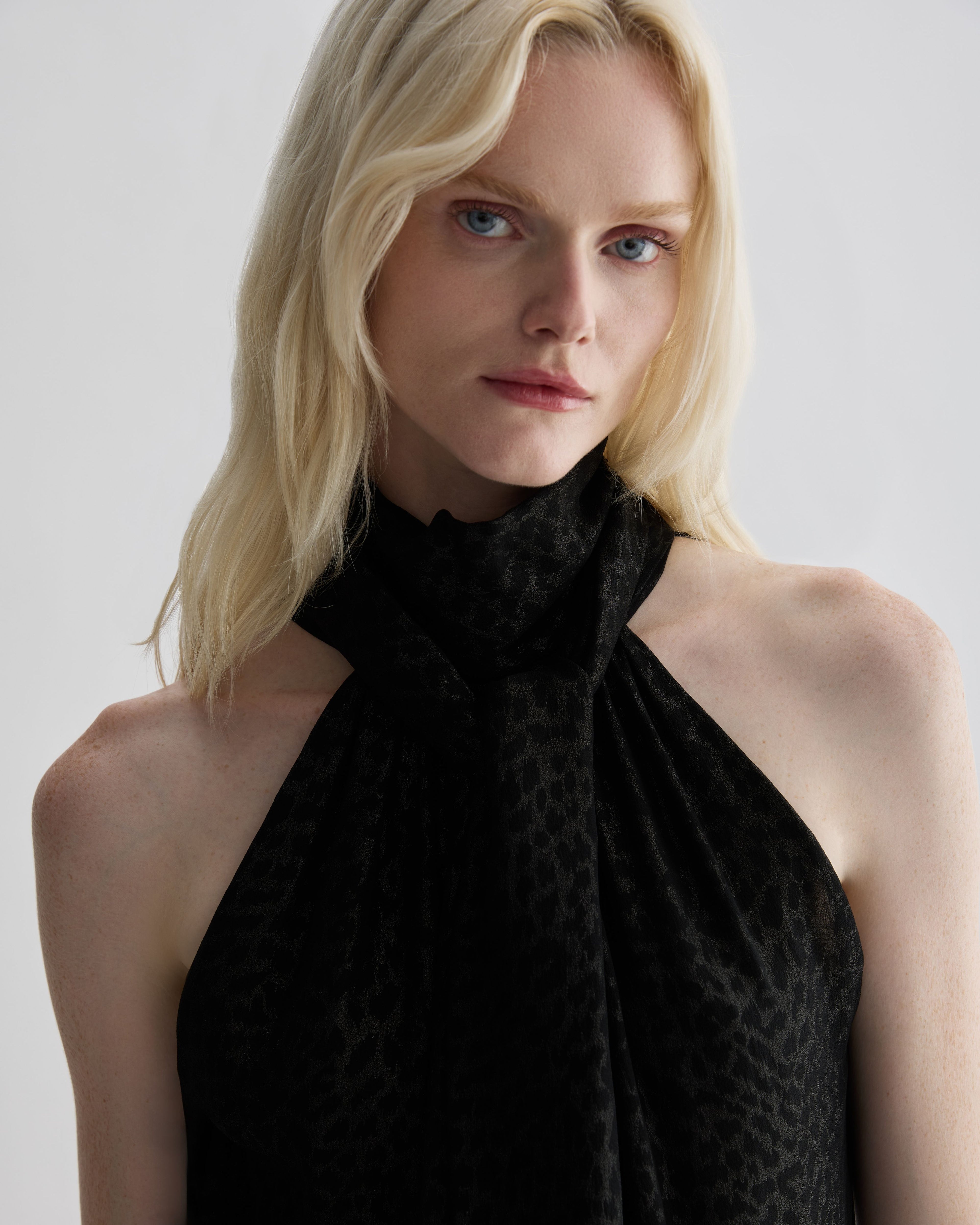 Silver leopard print silk Elysia top by Veronica De Piante, showcasing a stylish design and elegant fabric draping.