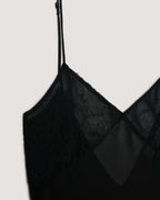 Martina black camisole packshot: semi-sheer wool, Chantilly lace cups, Georgette lining, adjustable strap