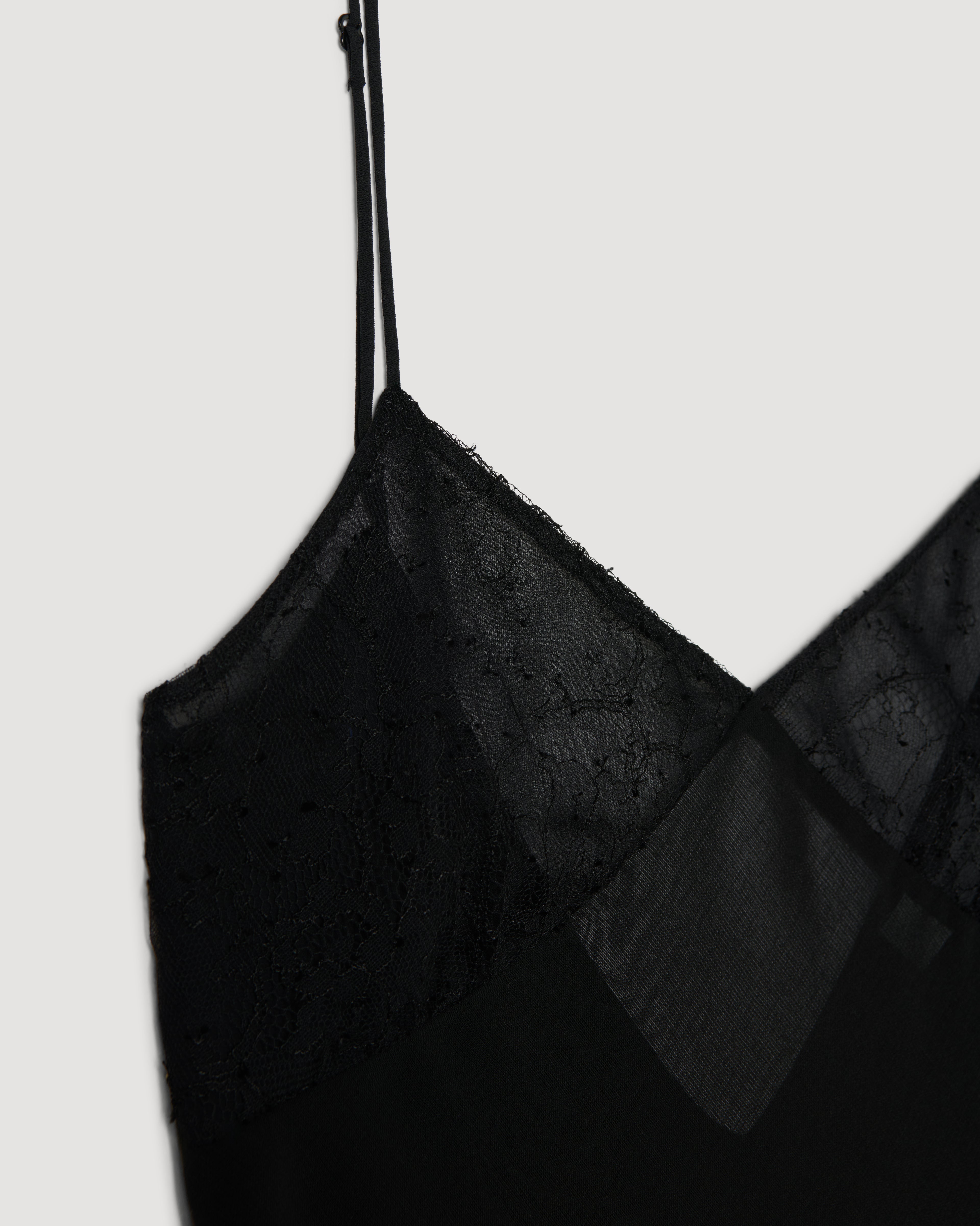 Martina black camisole packshot: semi-sheer wool, Chantilly lace cups, Georgette lining, adjustable strap