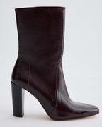 Veronica De Piante Gaia heeled ankle boots in burgundy patent leather, stylish shoes with a sleek design and pointed toe.
