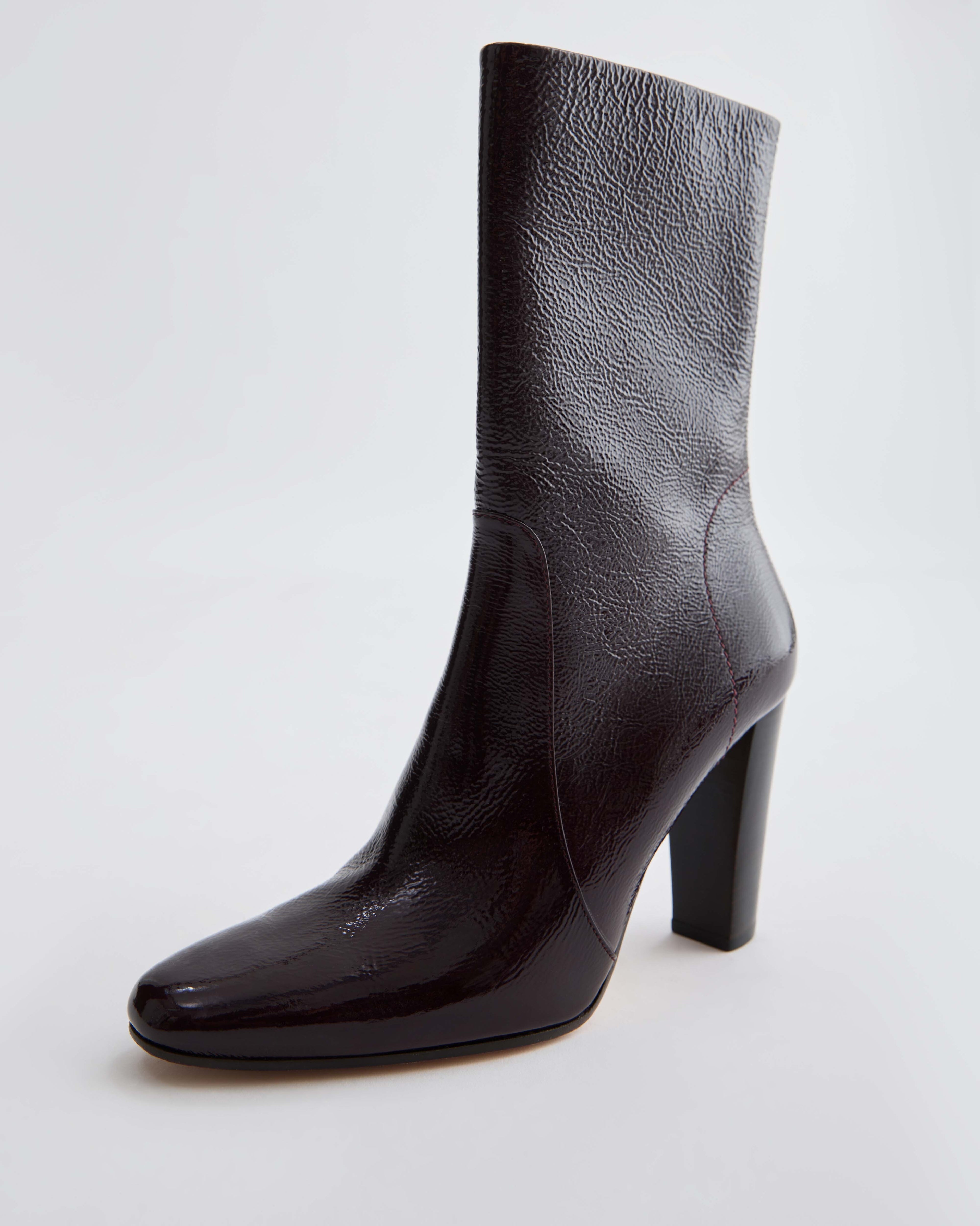 Veronica De Piante Gaia heeled ankle boots in burgundy patent leather, stylish shoes with a sleek ankle-high design.