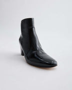 Black patent leather Paloma boots by Veronica De Piante featuring sleek design and pointed toe, stylish shoes for women.