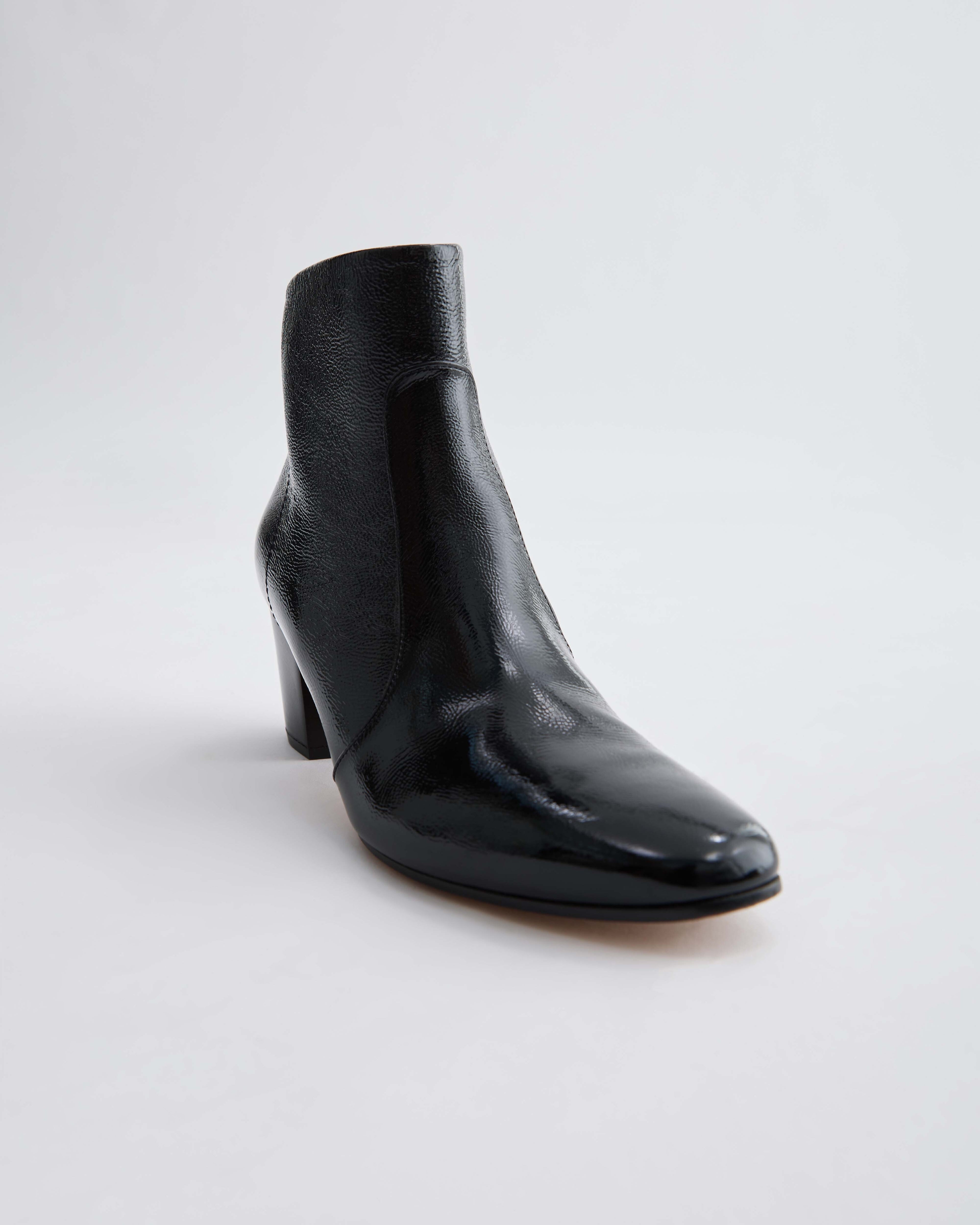 Black patent leather Paloma boots by Veronica De Piante featuring sleek design and pointed toe, stylish shoes for women.