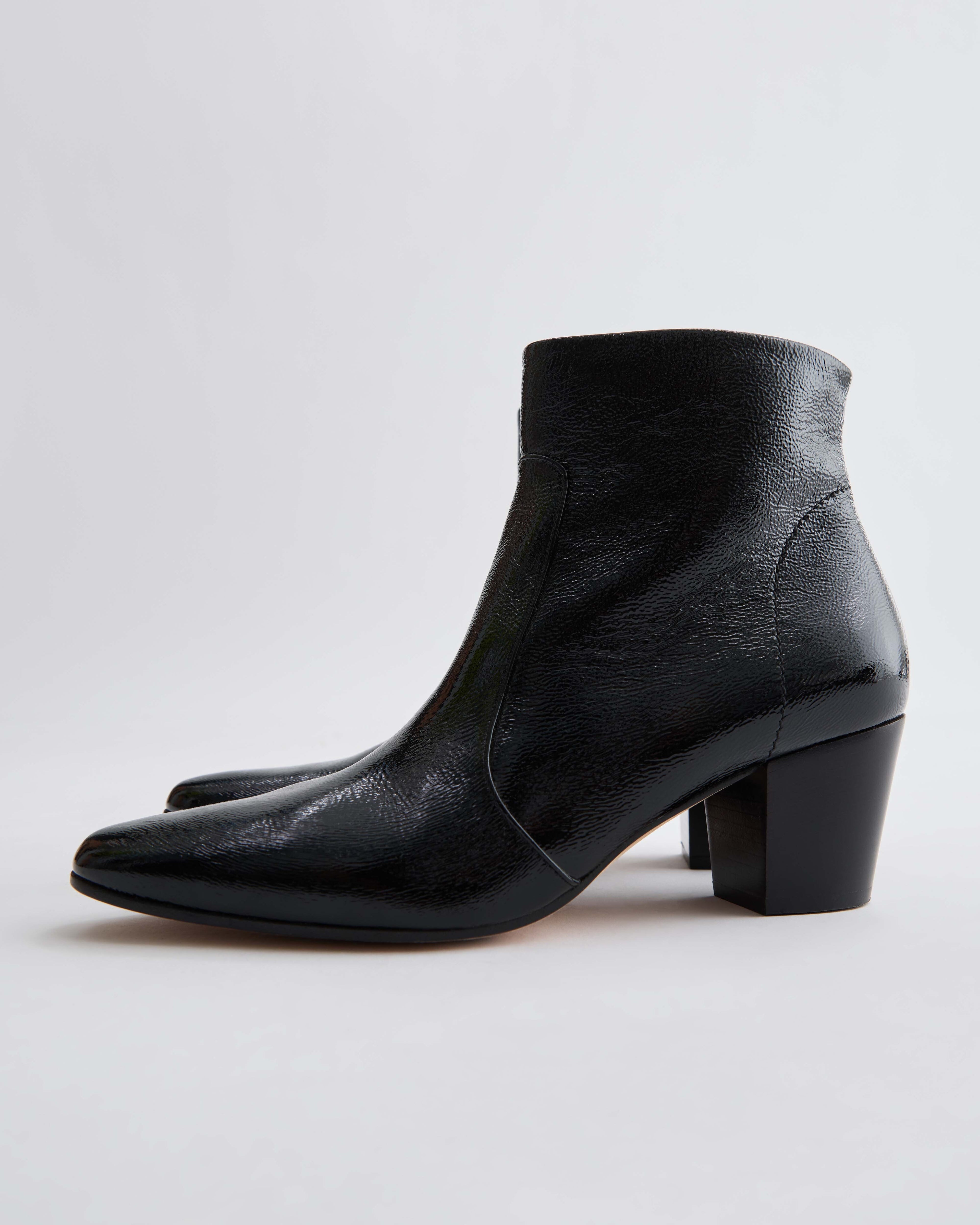 Black patent leather Paloma boots by Veronica De Piante, stylish shoes with sleek, shiny finish and modern design.