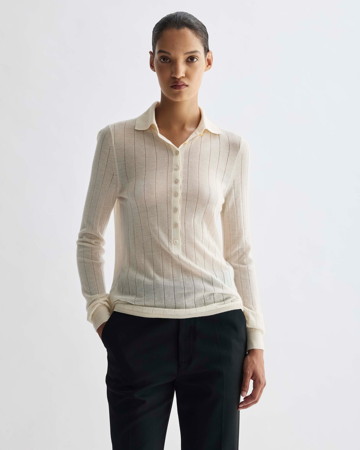 Ivory fine knit long-sleeve polo shirt with delicate openwork pattern and button placket