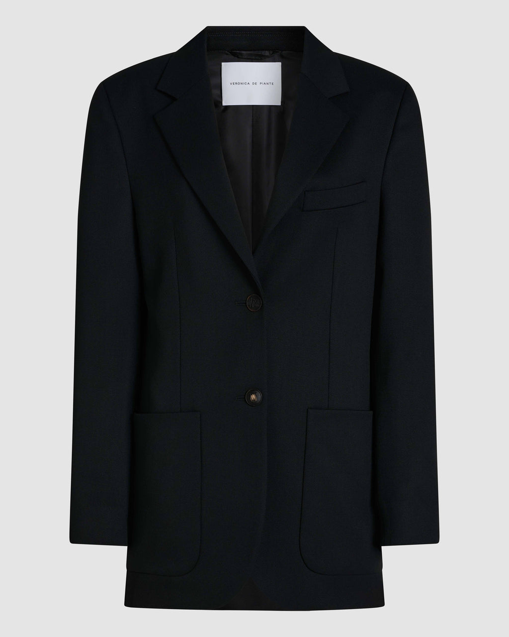 Black Sebastian jacket in stretch wool twill by Veronica De Piante, shown on a mannequin, featuring a tailored fit and classic design.