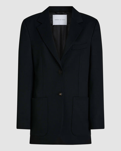 Black Sebastian jacket in stretch wool twill by Veronica De Piante, shown on a mannequin, featuring a tailored fit and classic design.