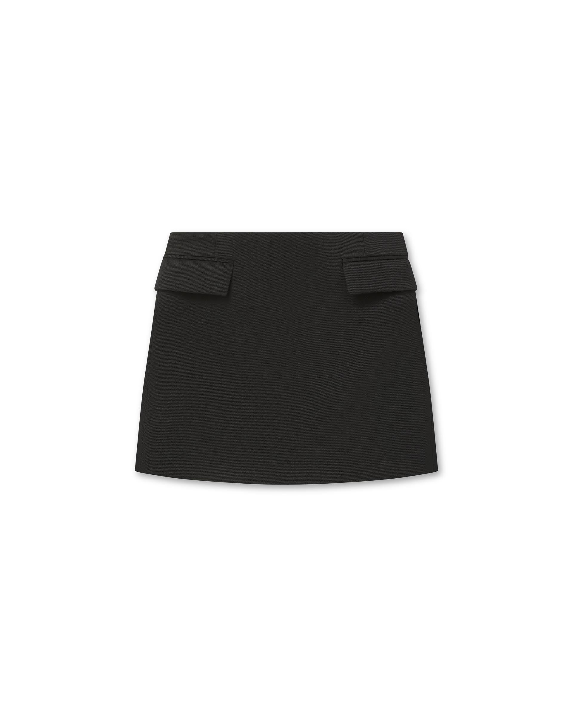 Black Cecily wool twill skirt with functional pockets by Veronica De Piante, shown flat on a surface.