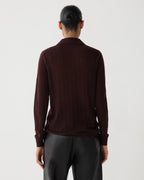 Veronica De Piante Luna Polo in burgundy cashmere knitwear, close-up of soft, luxurious fabric and classic polo collar.