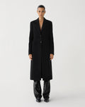 Black Freya cashmere coat, a women's luxury Italian overcoat. Tailored with broad shoulders and a slouchy, roomy fit