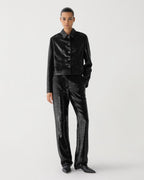 Black Ines jacket in flat sequin by Veronica De Piante, showcasing the shiny, textured sequin details on a stylish coat.