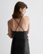 Black Amelia dress in soft nappa leather by Veronica De Piante, shown on a model with elegant styling.