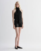 Black Helena Shorts in Stretch Sequin by Veronica De Piante, featuring shiny sequin embellishments and a fitted waistband.