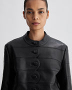 Black Rory jacket in Nappa leather by Veronica De Piante, showcasing the sleek, tailored coat with smooth leather texture.