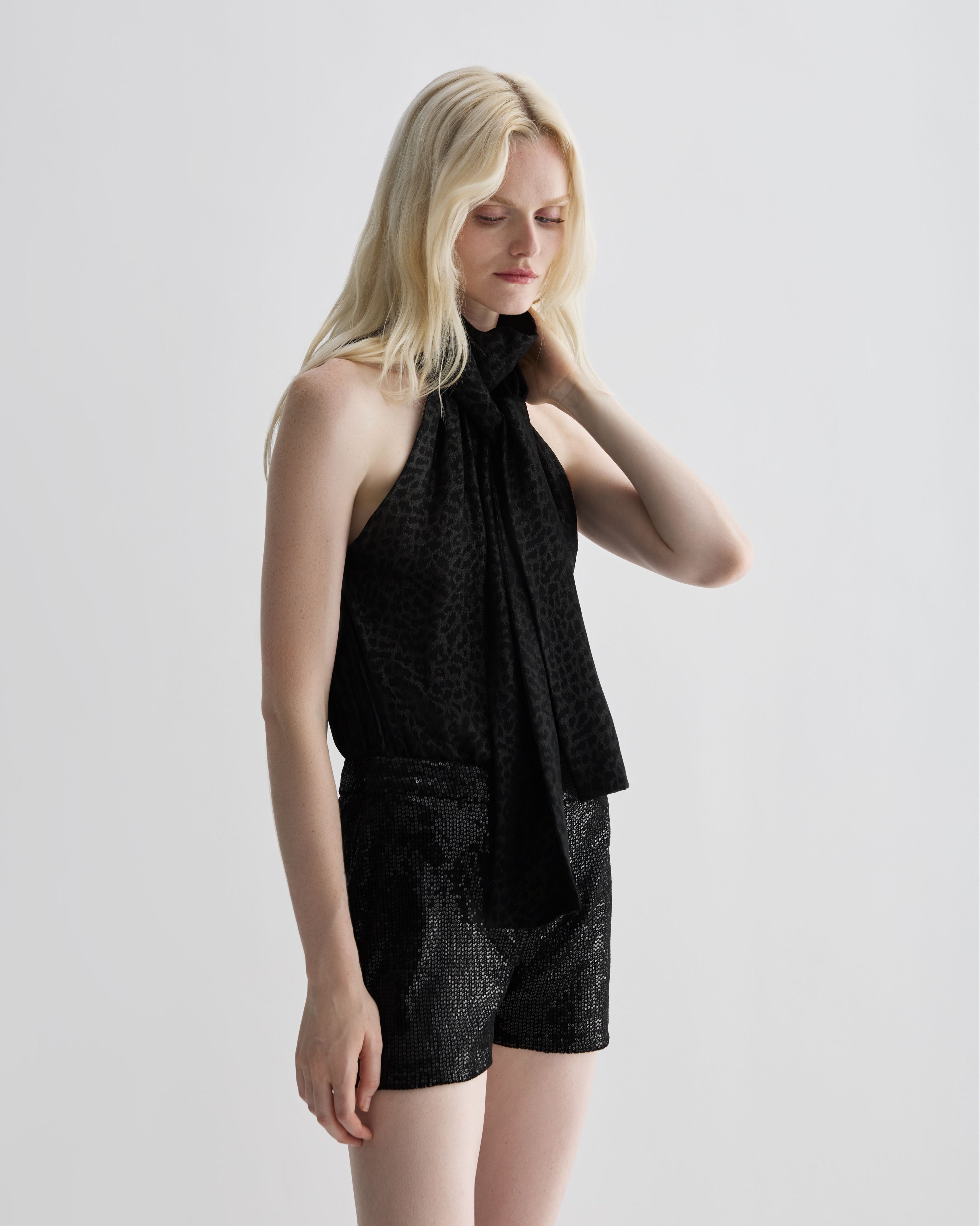 Silver leopard print silk Elysia top by Veronica De Piante displayed on a mannequin, showcasing its elegant design.