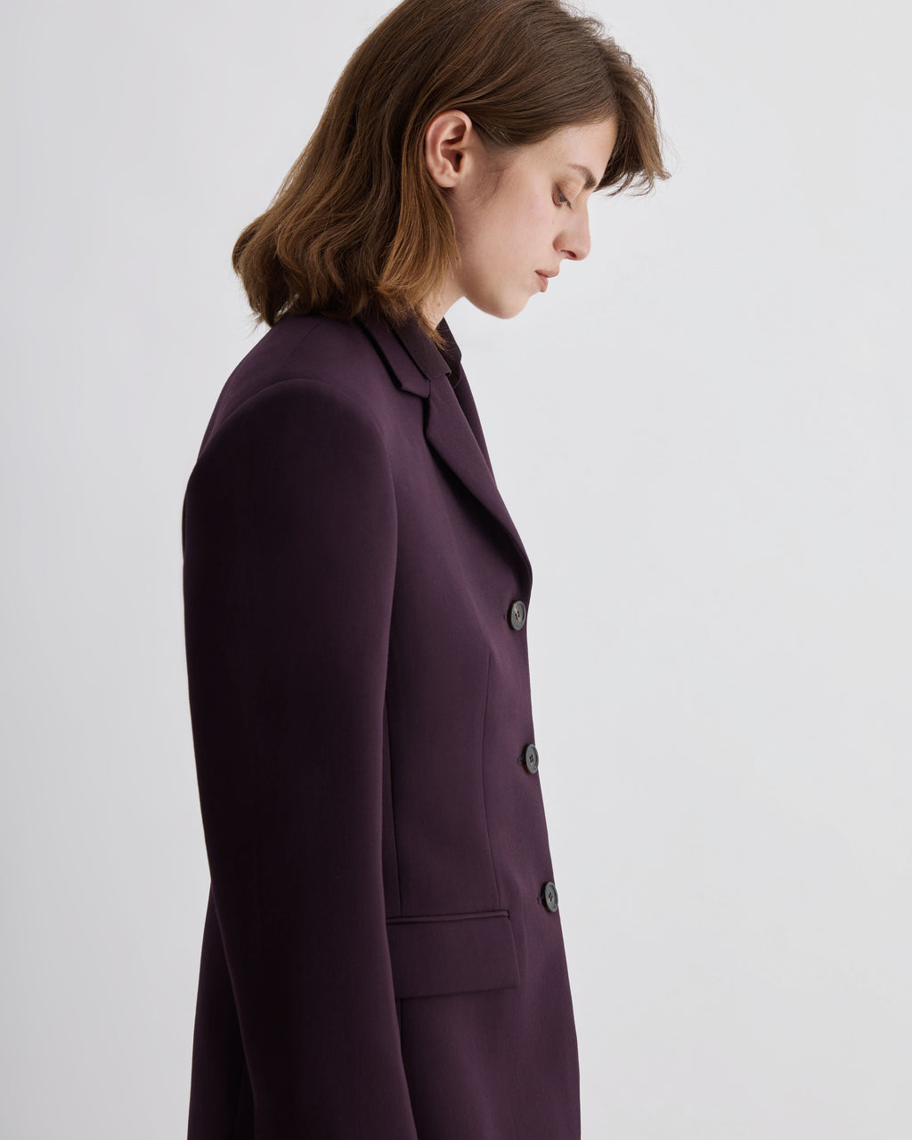 Deep plum wool Fini jacket by Veronica De Piante, showcasing a stylish coat design with a tailored silhouette.