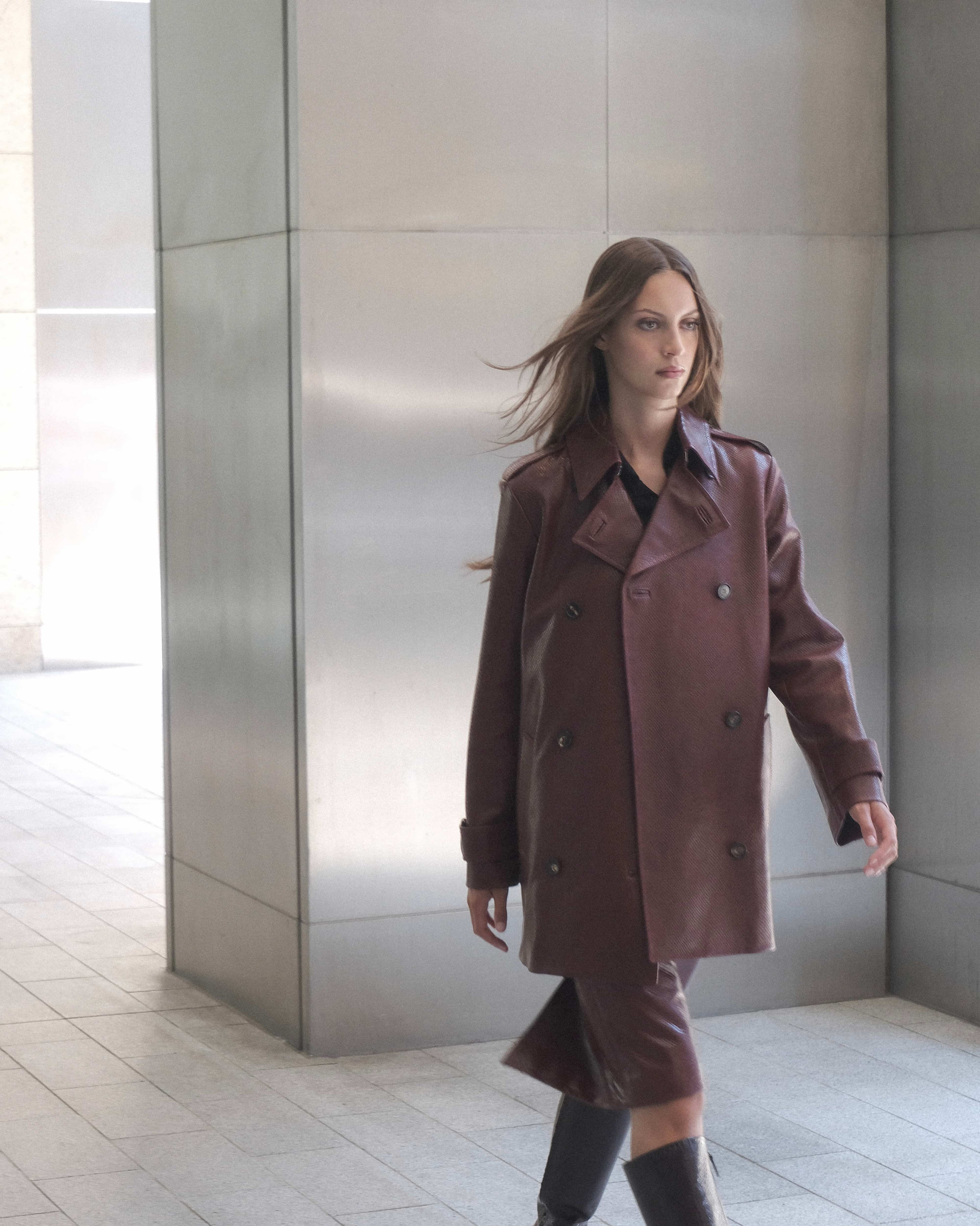 Dark red Charlotte trench coat in embossed leather by Veronica De Piante, shown with front view and detailed texture.