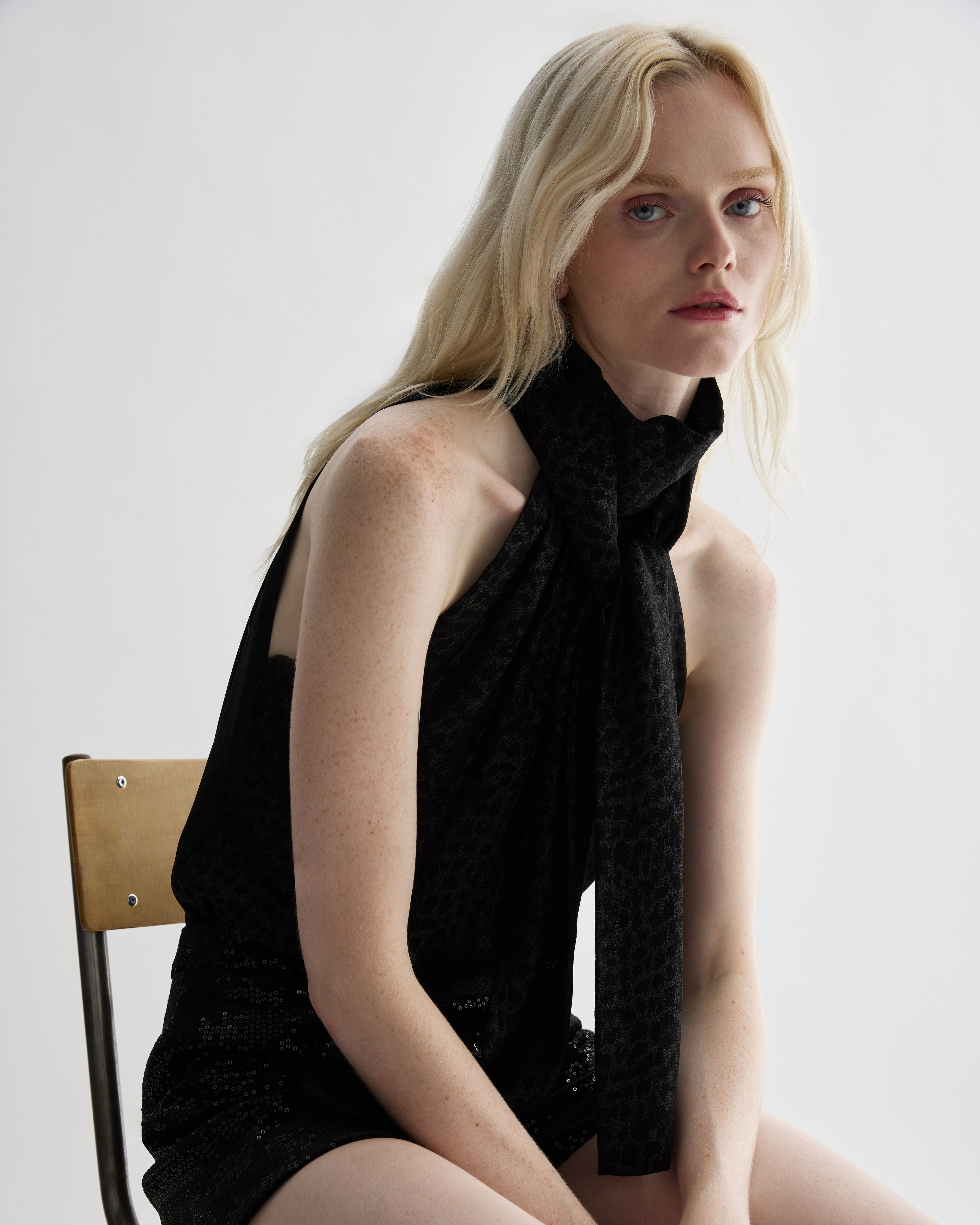 Silver leopard print silk Elysia top by Veronica De Piante, featuring a flowy design and elegant neckline.
