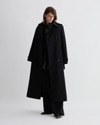 Black patent leather Jess Jacket by Veronica De Piante, stylish coat with a sleek, shiny finish and modern design.