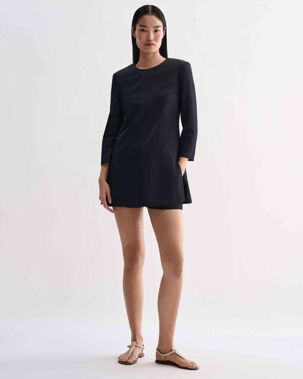 Black silk Ambar Tunic by Veronica De Piante, showcasing its elegant drape and relaxed fit as worn on a model.