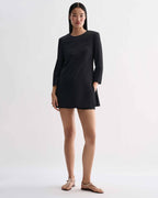 Black silk Ambar Tunic by Veronica De Piante, showcasing its elegant drape and relaxed fit as worn on a model.