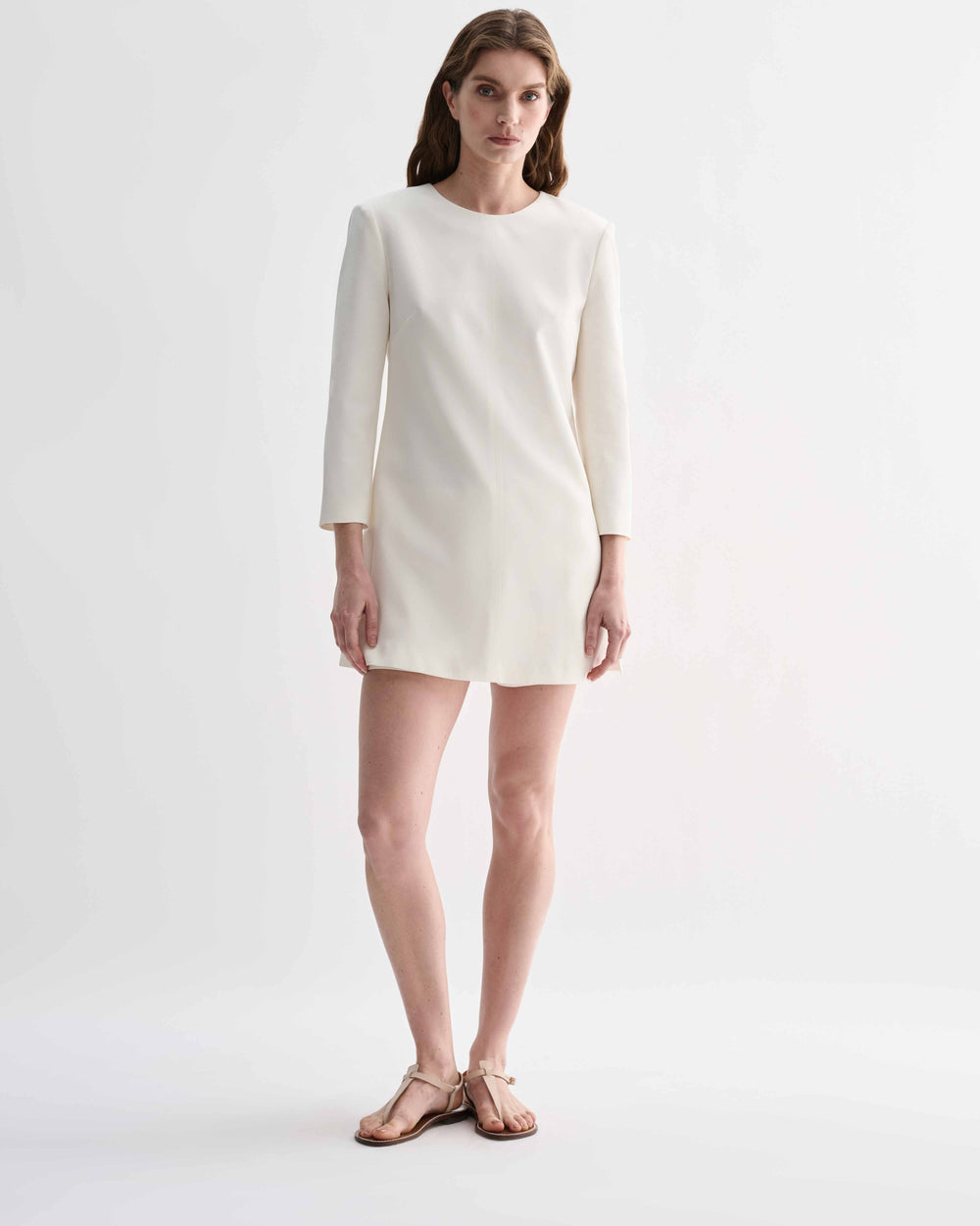Off-white silk Ambar Tunic by Veronica De Piante, featuring flowing fabric and elegant design, displayed on a plain background.