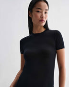 Black Bea Knit Top in superfine Merino wool by Veronica De Piante, featuring a close-up of the textured knit fabric.