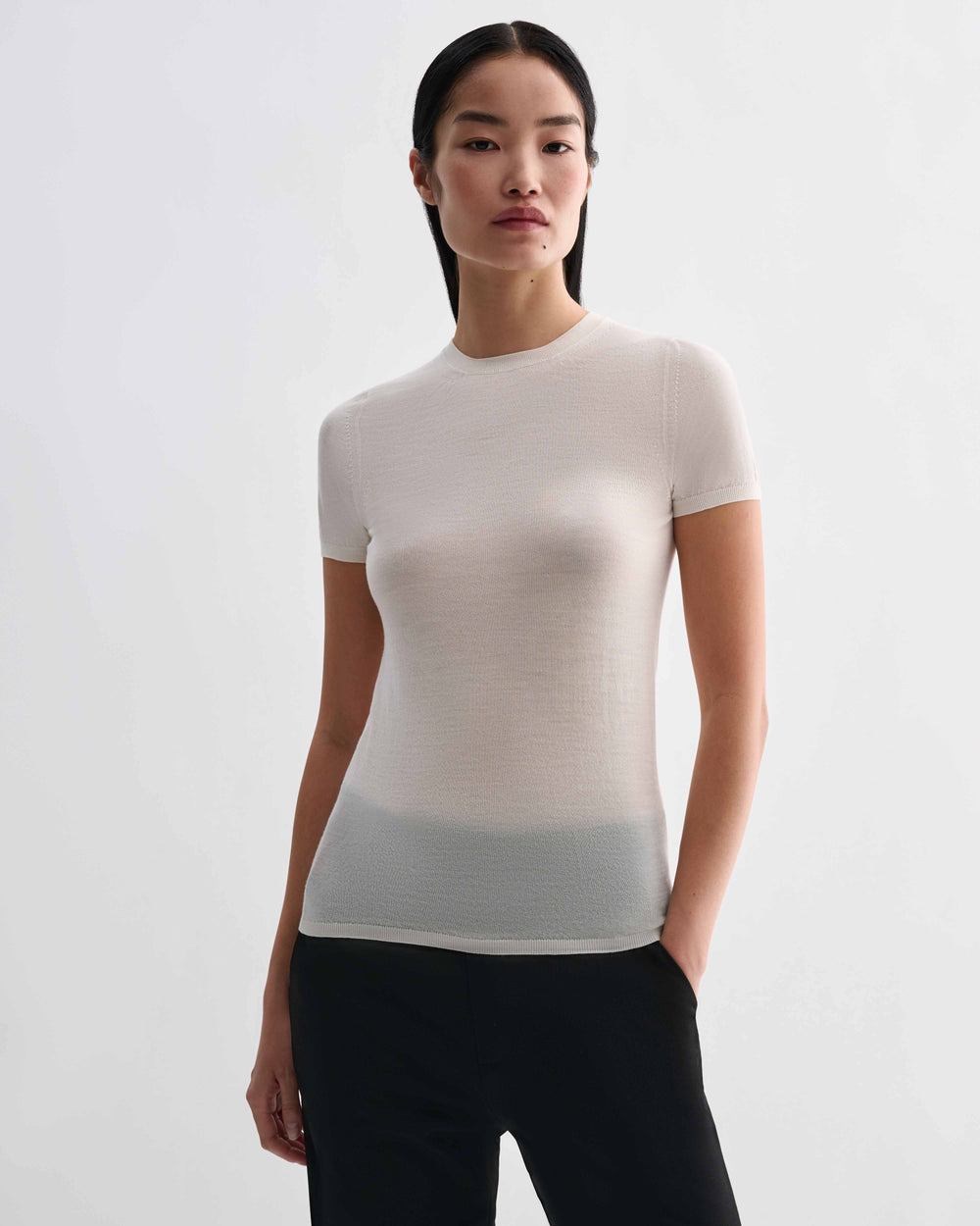 Veronica De Piante Bea Knit Top in superfine merino wool, off-white color, close-up of soft, textured knit fabric.