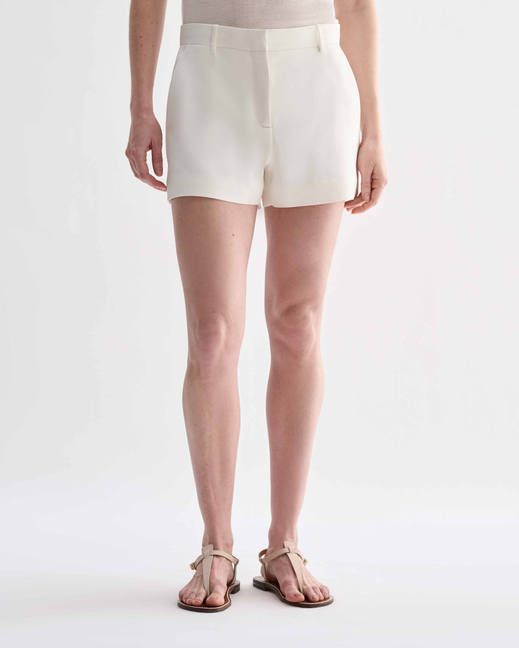 Off-white silk Belle Shorts by Veronica De Piante featuring a relaxed fit and elegant design, displayed on a neutral background.