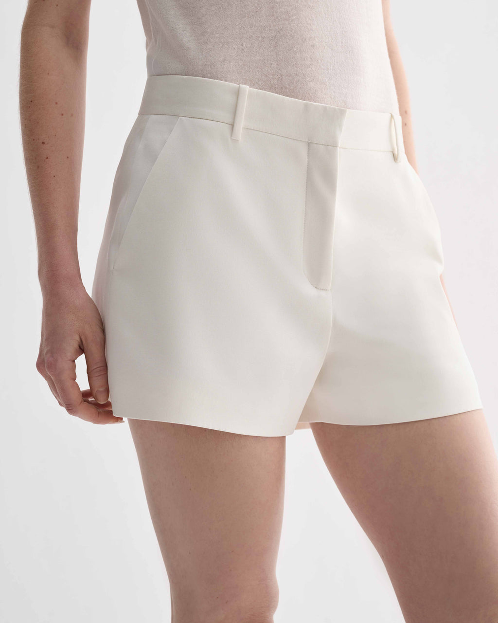 Off-white silk Belle Shorts by Veronica De Piante, featuring a relaxed fit and elegant design, shown on a neutral background.