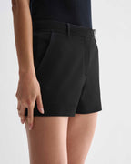 Black silk Belle Shorts by Veronica De Piante, featuring smooth fabric and stylish design, shown on a neutral background.