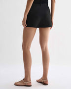 Black silk Belle shorts by Veronica De Piante featuring a smooth, luxurious fabric and a relaxed fit.