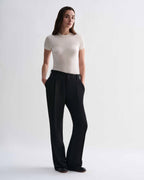 Black Billie linen trousers by Veronica De Piante, showcasing a relaxed fit and stylish design in a natural fabric.