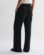 Veronica De Piante Billie linen trousers in black, stylish and comfortable bottoms shown on a model.