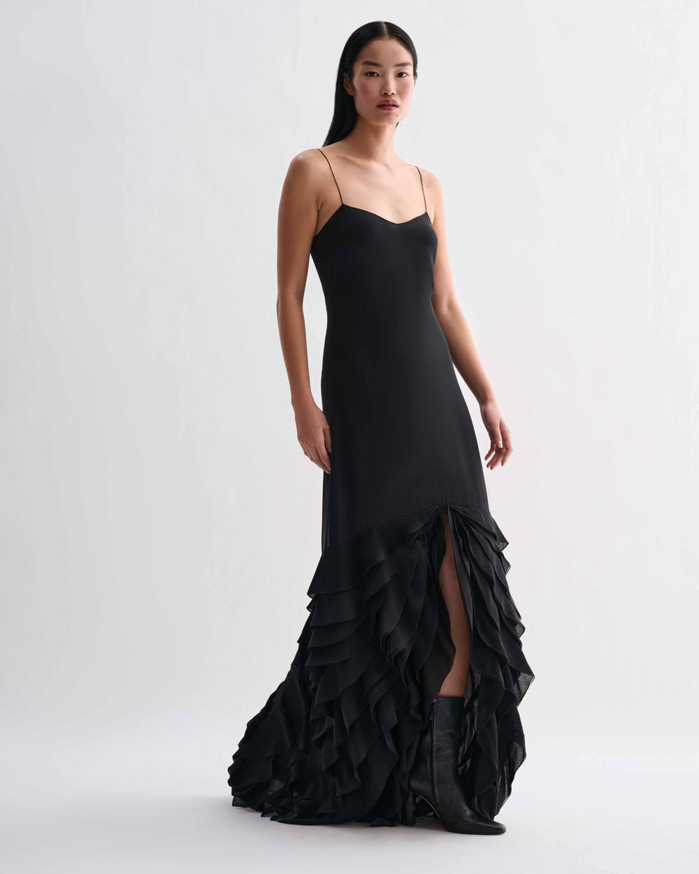Black Calista dress in georgette fabric by Veronica De Piante, featuring a flowing silhouette and elegant design.