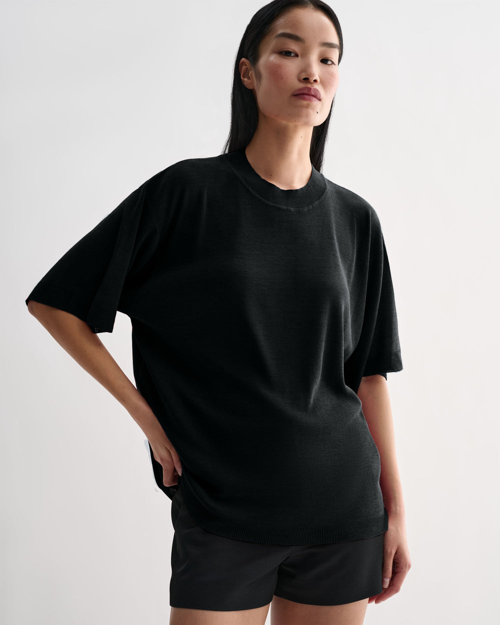 Black Carys knit top by Veronica De Piante, featuring a fitted Viscose design, shown on a mannequin.