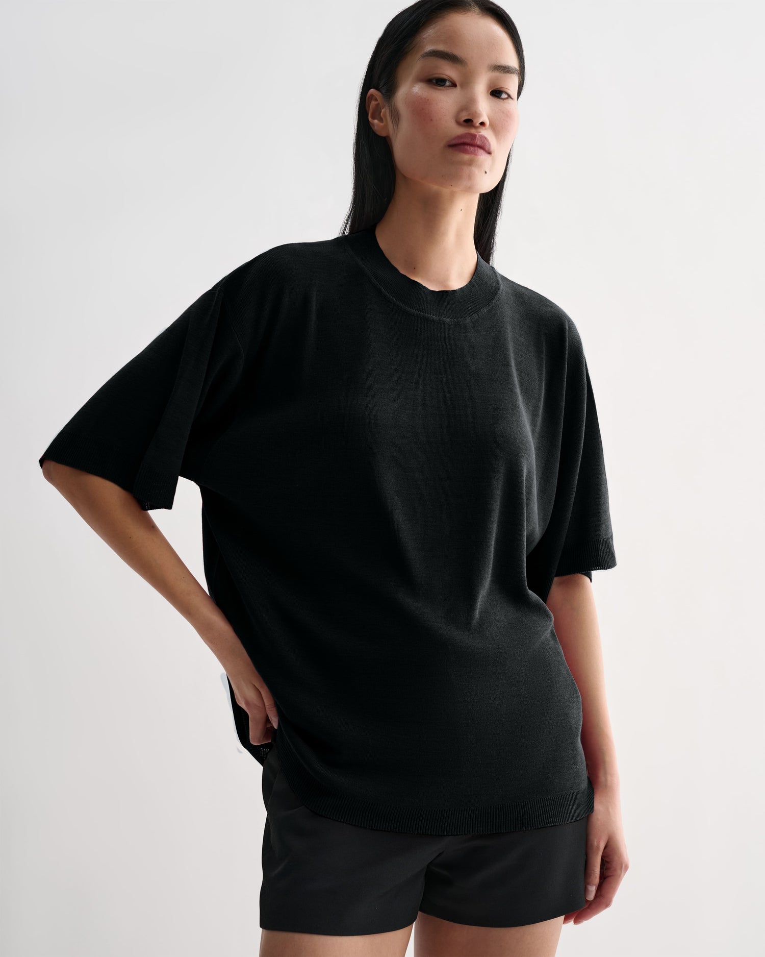 Black Carys knit top by Veronica De Piante, featuring a fitted Viscose design, shown on a mannequin.