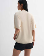 Off-white Carys knit T-shirt by Veronica De Piante, featuring a soft viscose fabric and casual, comfortable top style.