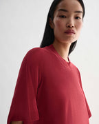 Red Carys knit T-shirt by Veronica De Piante, made of viscose, shown with short sleeves and a relaxed fit.