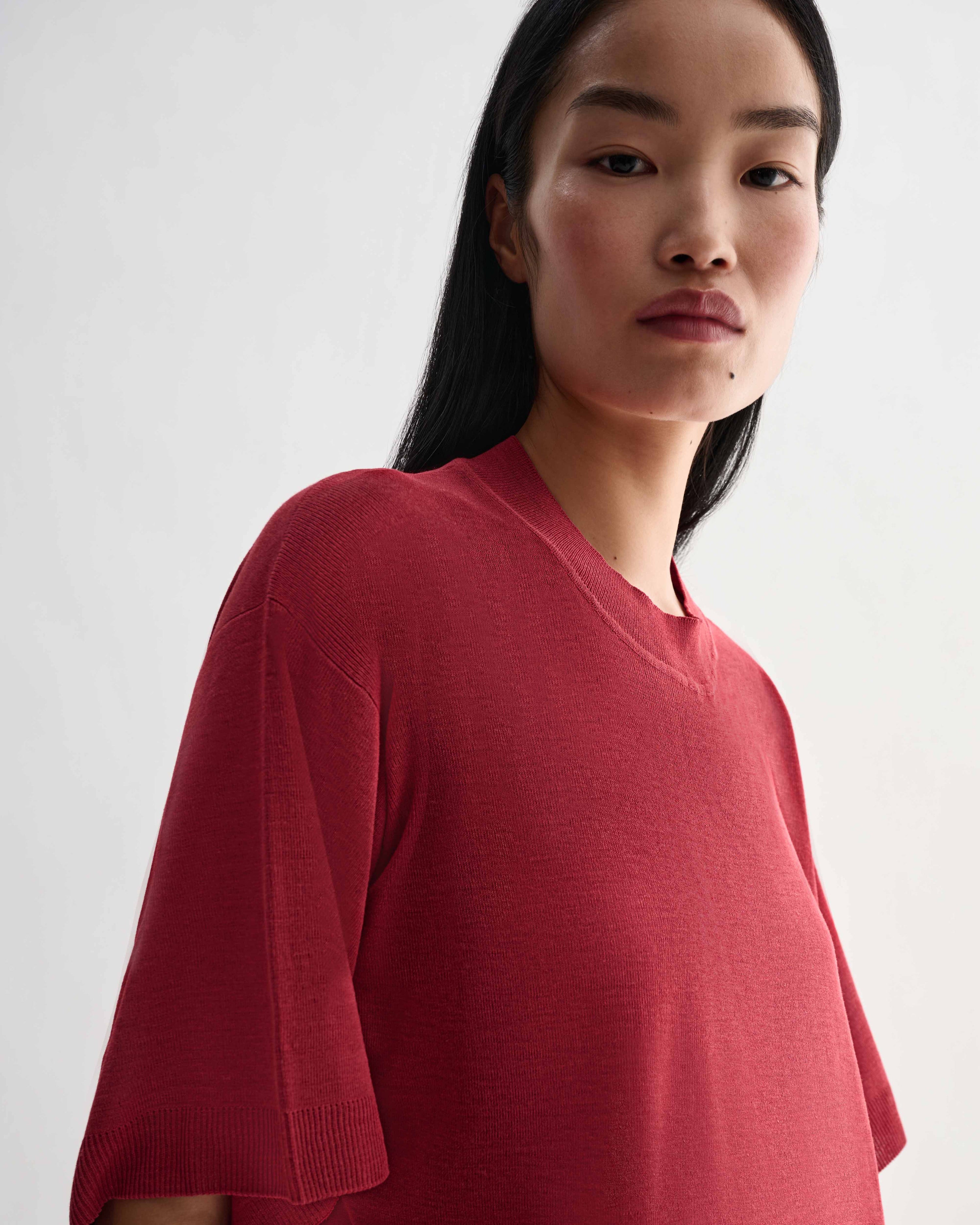 Red Carys knit T-shirt by Veronica De Piante, made of viscose, shown with short sleeves and a relaxed fit.