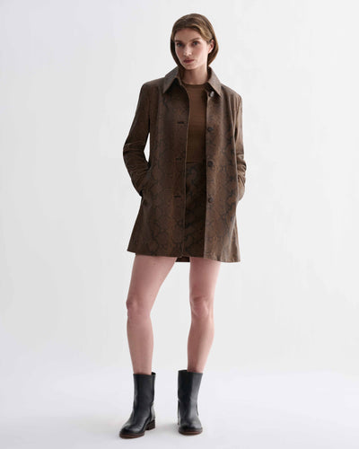Model wears Chiara Coat: camel snake print embossed goatskin leather tailored jacket, direct fit, luxury city shell