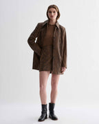 Cecily Skirt, camel snake print leather mini skirt on model. Premium women's designer skirt