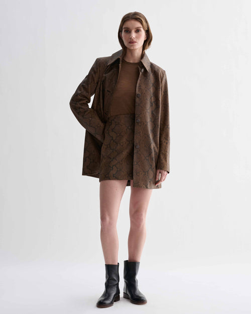 Cecily Skirt, camel snake print leather mini skirt on model. Premium women's designer skirt