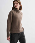 Camel wool cashmere Cielo sweater, chunky knit, relaxed fit. Features adjustable side buttoning neckline with horn buttons