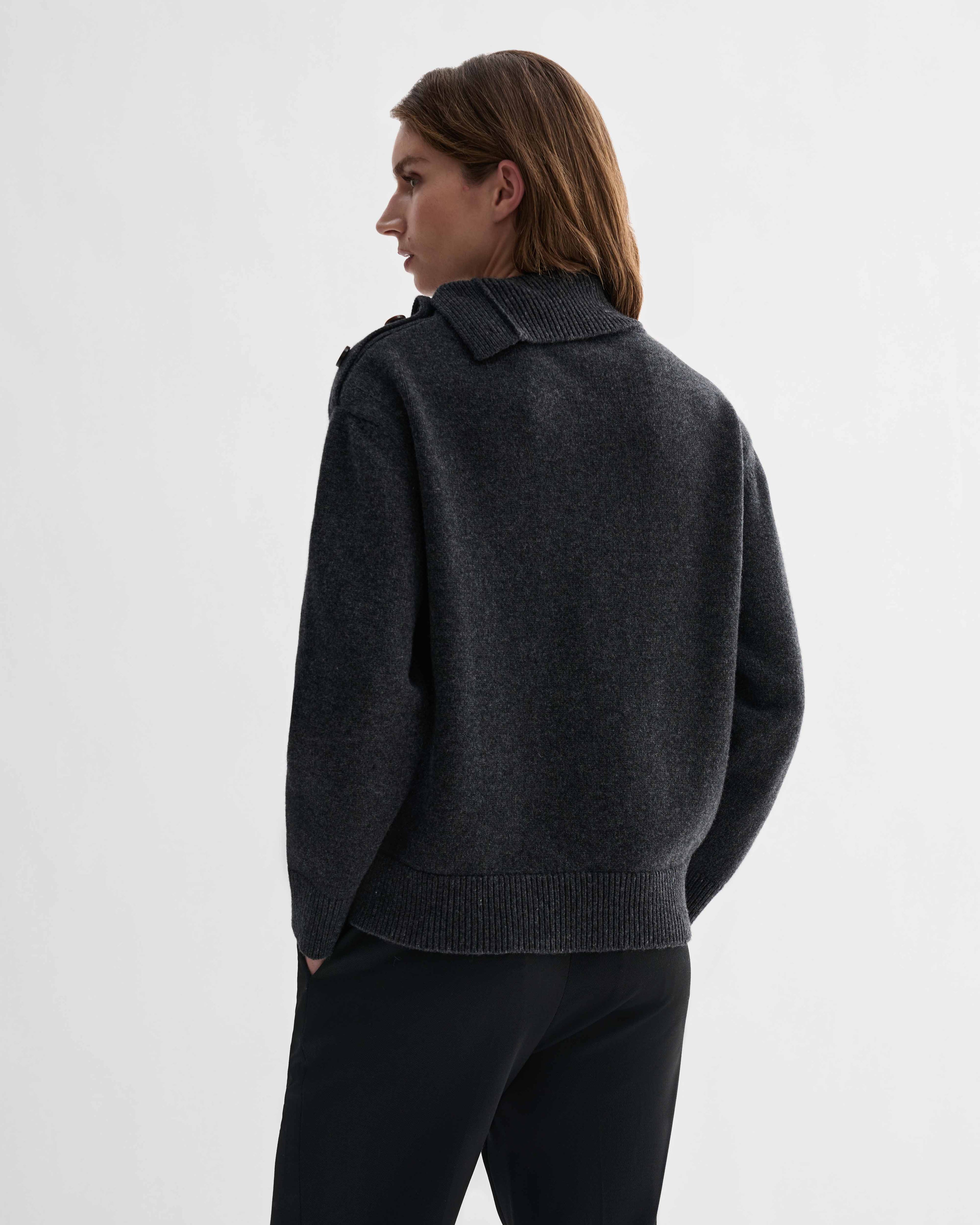 Cielo Charcoal Wool Cashmere chunky knit sweater with adjustable side buttoning and horn buttons, relaxed fit, worn by model