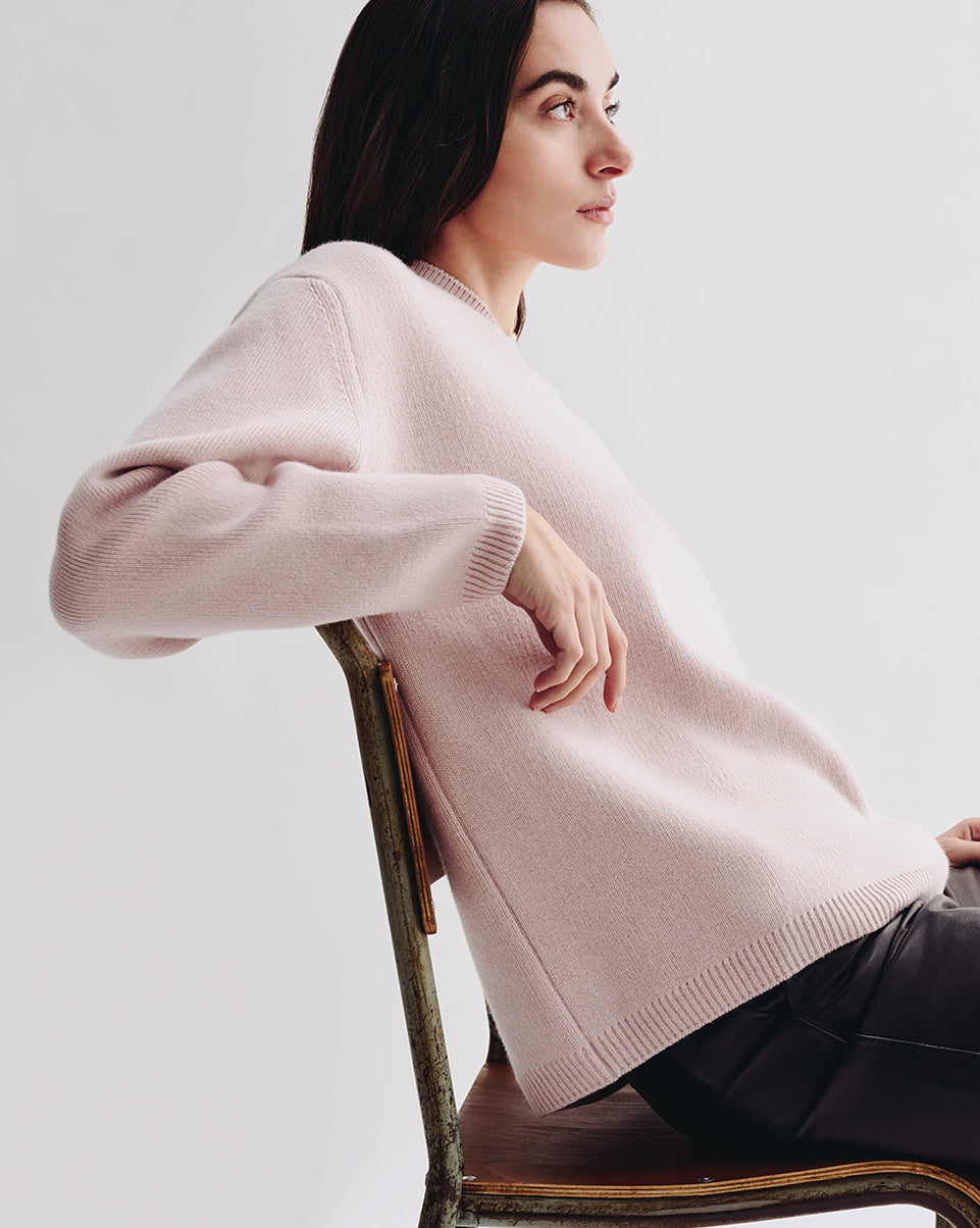 Blush pink women's cashmere crewneck sweater, relaxed fit, fine gauge knit with ribbed cuffs and hem