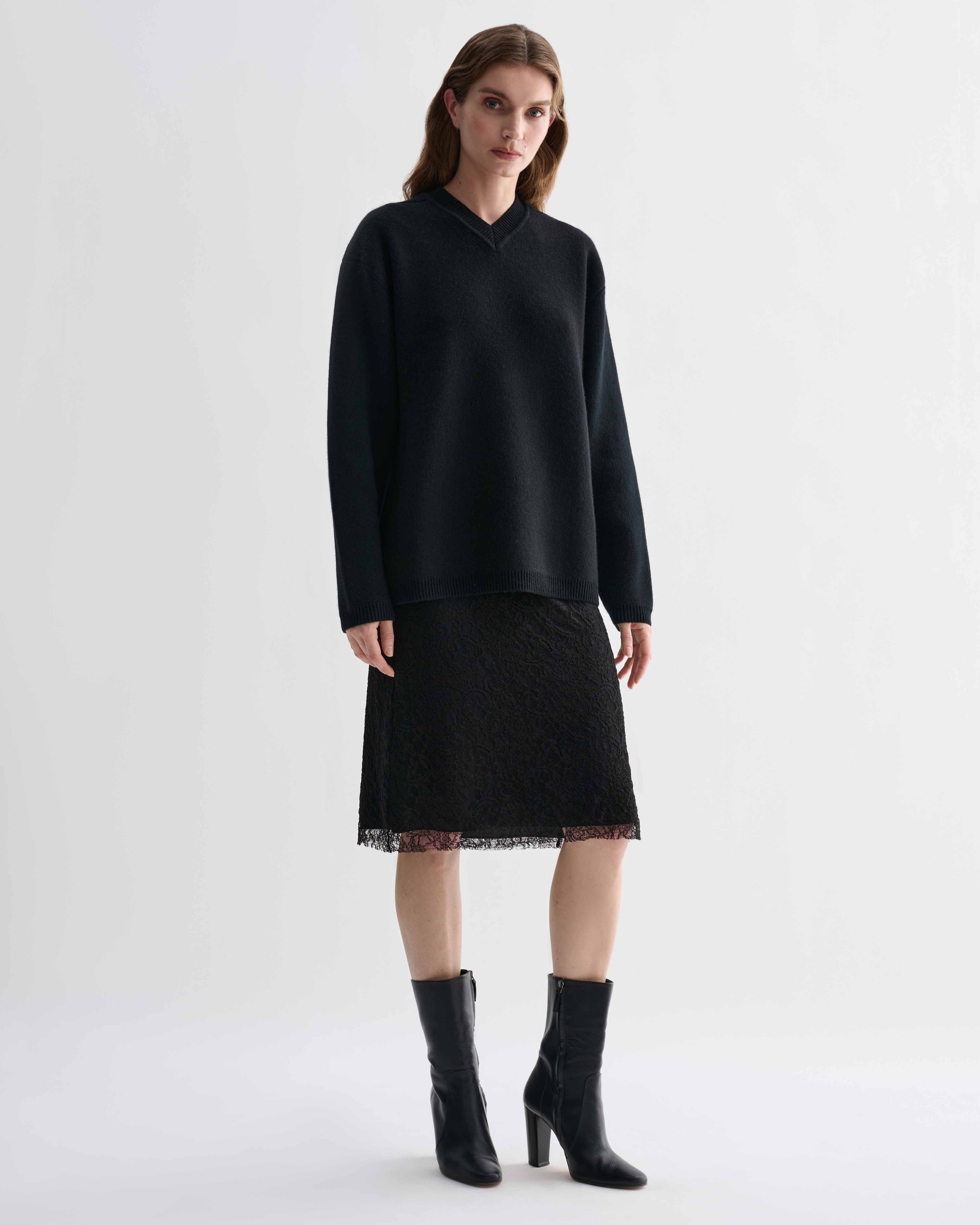 Elara black cashmere V-neck sweater, relaxed fit knitwear. Elevated compact dense knit